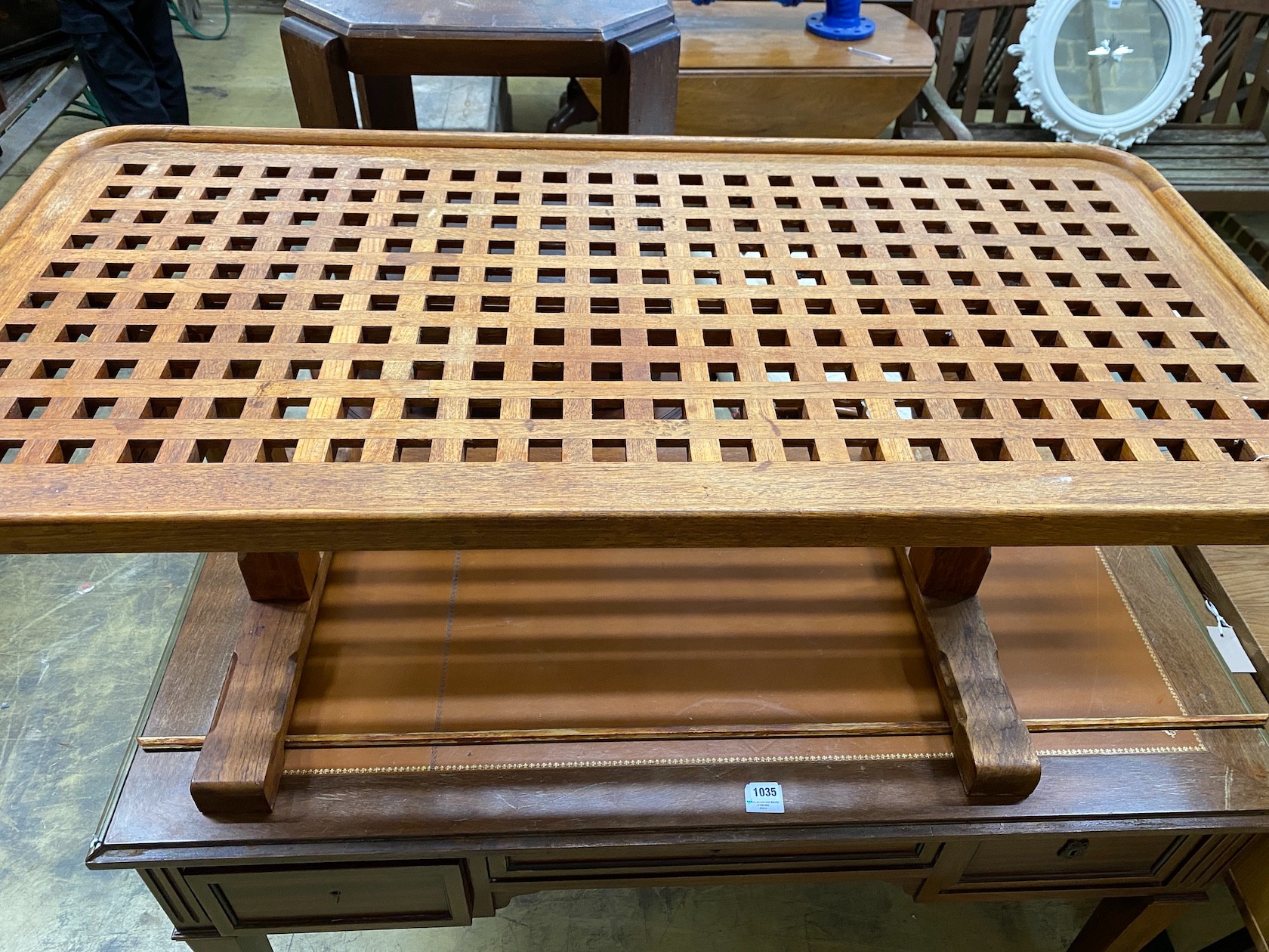 An Arts & Crafts style rectangular oak lattice top coffee table, length 123cm, width 62cm, height 47cm